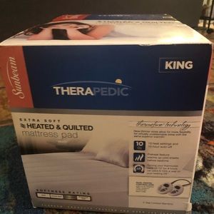 Brand new heated and quilted mattress pad